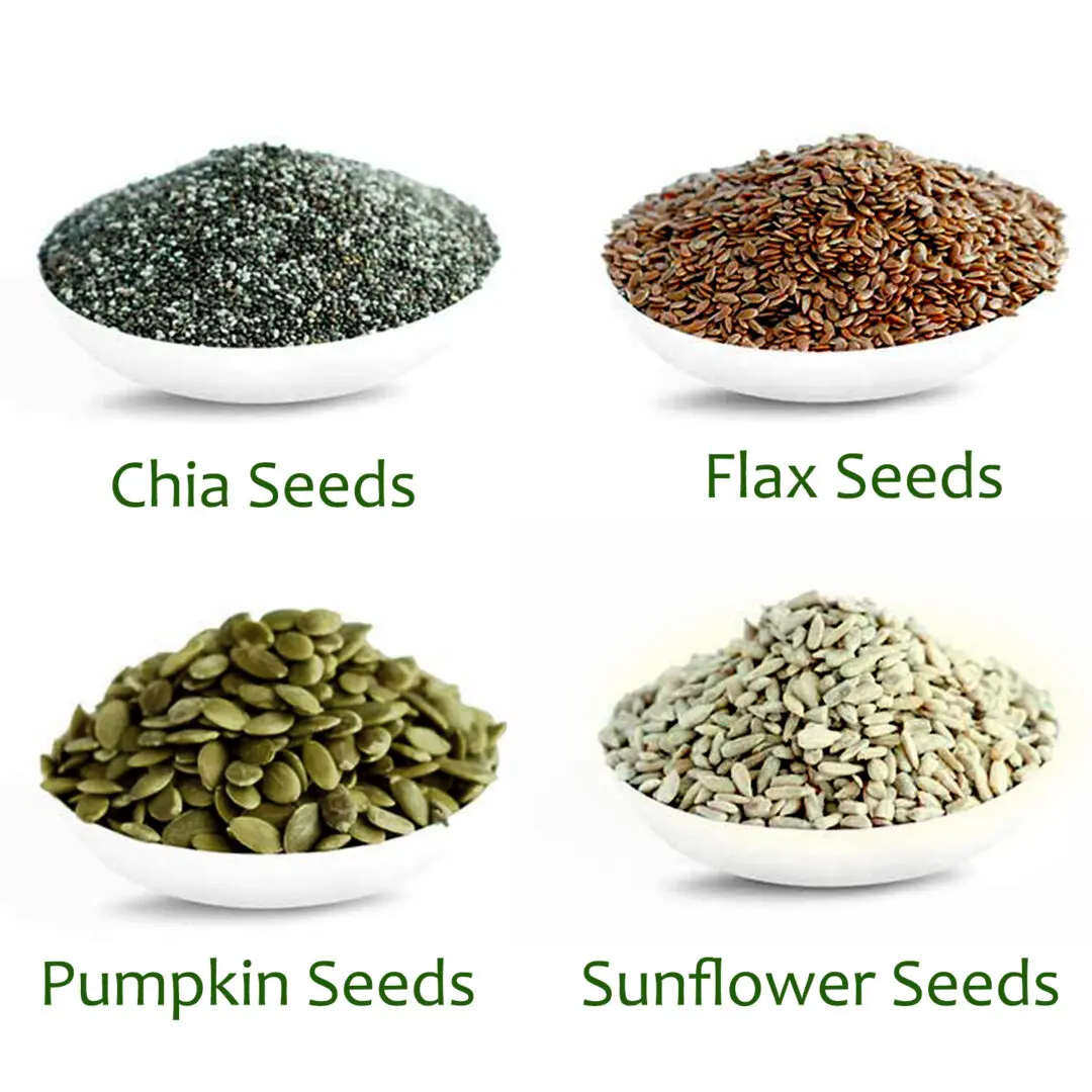 A bowl of seeds are shown with four different types.